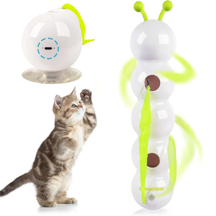Cute kitten playing with an automatic interactive cat toy designed for entertainment and exercise.