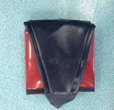Foldable dog swimming pool, portable and durable design, displayed in a folded position on a blue surface.