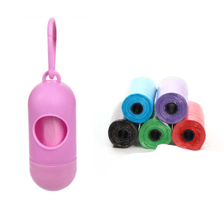 dog poop bags for cleanup in colorful rolls with a pink dispenser holder