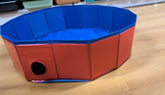 foldable dog swimming pool in red and blue with non-slip bottom, perfect for pets to play and cool off.