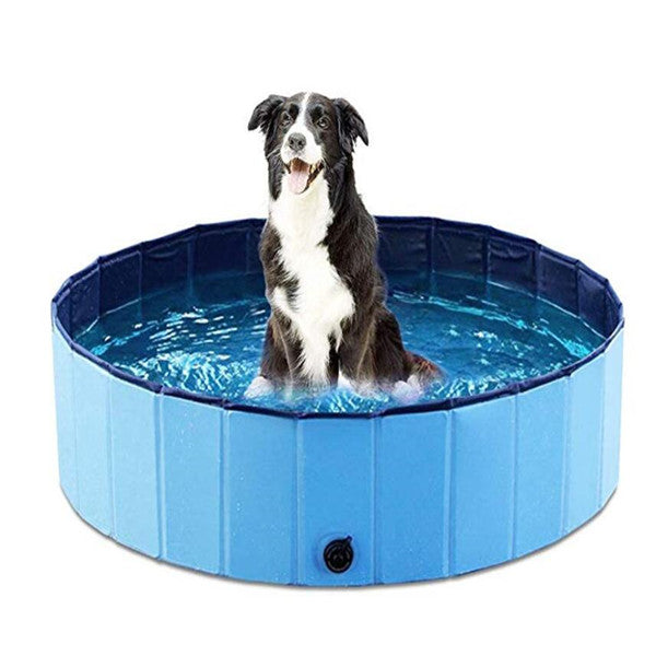 Foldable dog swimming pool with a happy dog playing in water, made of durable PVC material.