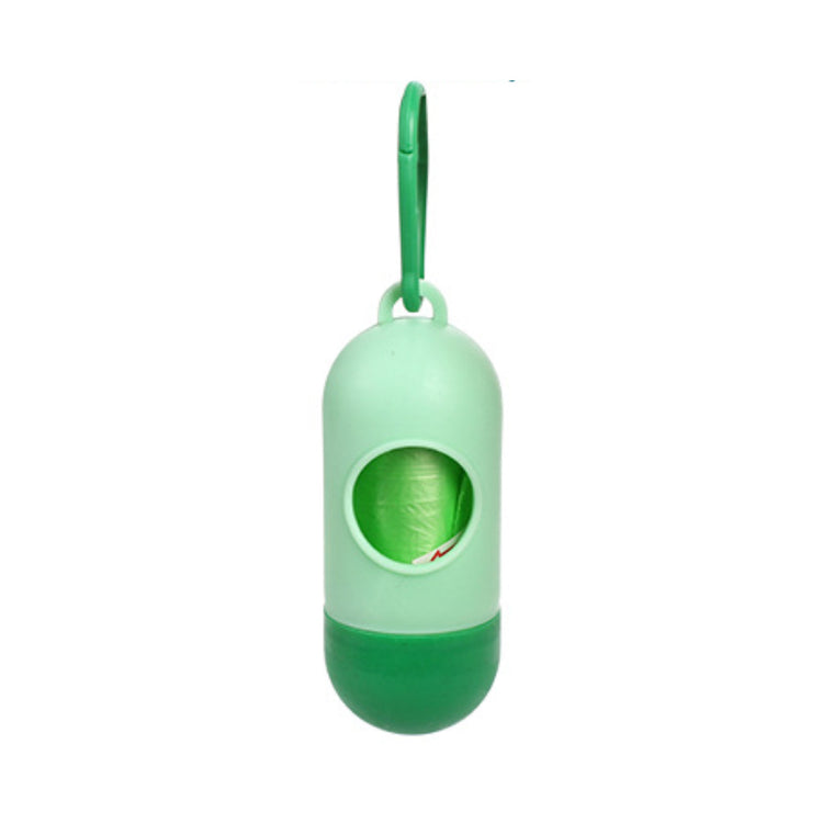 Green dog poop bags for cleanup dispenser with hanging loop and visible trash bag inside.