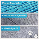 Close-up of dog sniffing training pad materials: soft cotton, sturdy oxford fabric, and high-quality felt with paw prints.