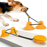 Suction cup pet toys in use with a dog playing, featuring orange suction cups and interactive design for pets.