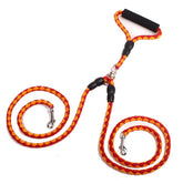 double-ended dog traction rope featuring heavy duty nylon and reflective threads for safety during walks.