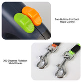 Close-up of the retractable dog leash for small dogs showing control buttons and 360-degree rotation metal hooks.