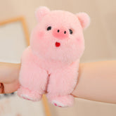 adorable plush animal dolls featuring a cute pink pig plush toy cuddled by a hand.