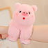 adorable plush animal dolls featuring a cute pink pig plush toy cuddled by a hand.