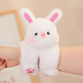 Adorable plush animal dolls featuring a cute white bunny plush toy with pink accents and a happy expression.