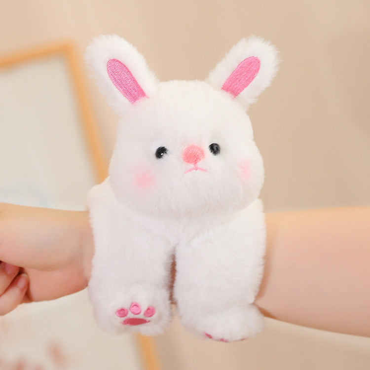 Adorable plush animal dolls featuring a cute white bunny plush toy with pink accents and a happy expression.