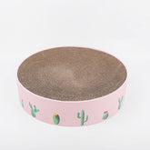 durable cat scratch board featuring a pink design with cacti and a corrugated scratching surface.