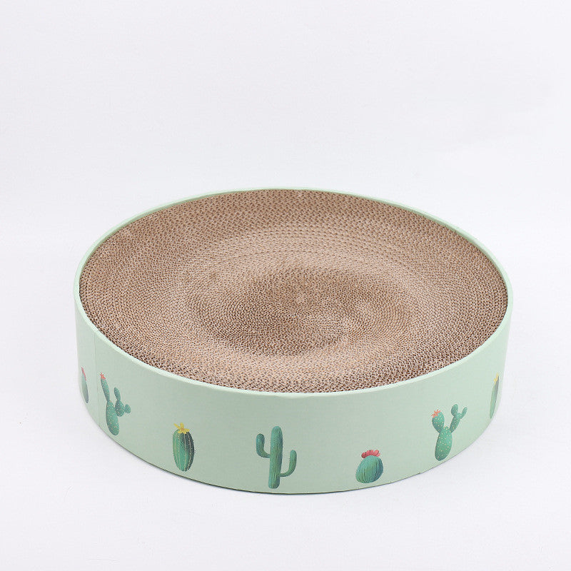 durable cat scratch board featuring a round design with cactus illustrations on a green base.