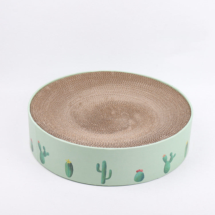 durable cat scratch board featuring a round design with cactus illustrations on a green base.