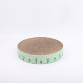 Durable cat scratch board featuring a round corrugated cardboard design with a colorful cactus print.