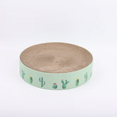 durable cat scratch board featuring a round design with cactus illustrations and sturdy corrugated surface for scratching.