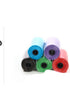 Dog poop bags for cleanup in assorted colors stacked together.
