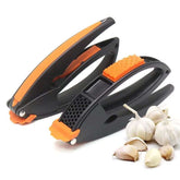 Manual Multifunctional Household Garlic Press Set Kitchen with ergonomic design and garlic cloves